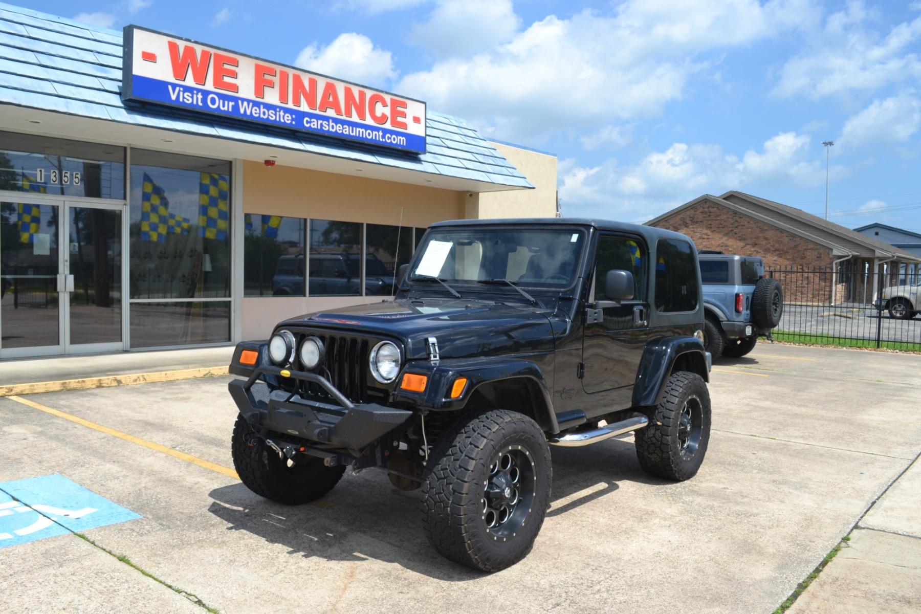 2003 BLACK /BLACK Jeep Wrangler X (1J4FA39S13P) with an 4.0L L6 OHV 12V engine, 4-Speed Automatic | 5-Speed Manual transmission, located at 1355 North 11th Street, Beaumont, 77702, (409) 832-0006, 30.094290, -94.130096 - Photo #0